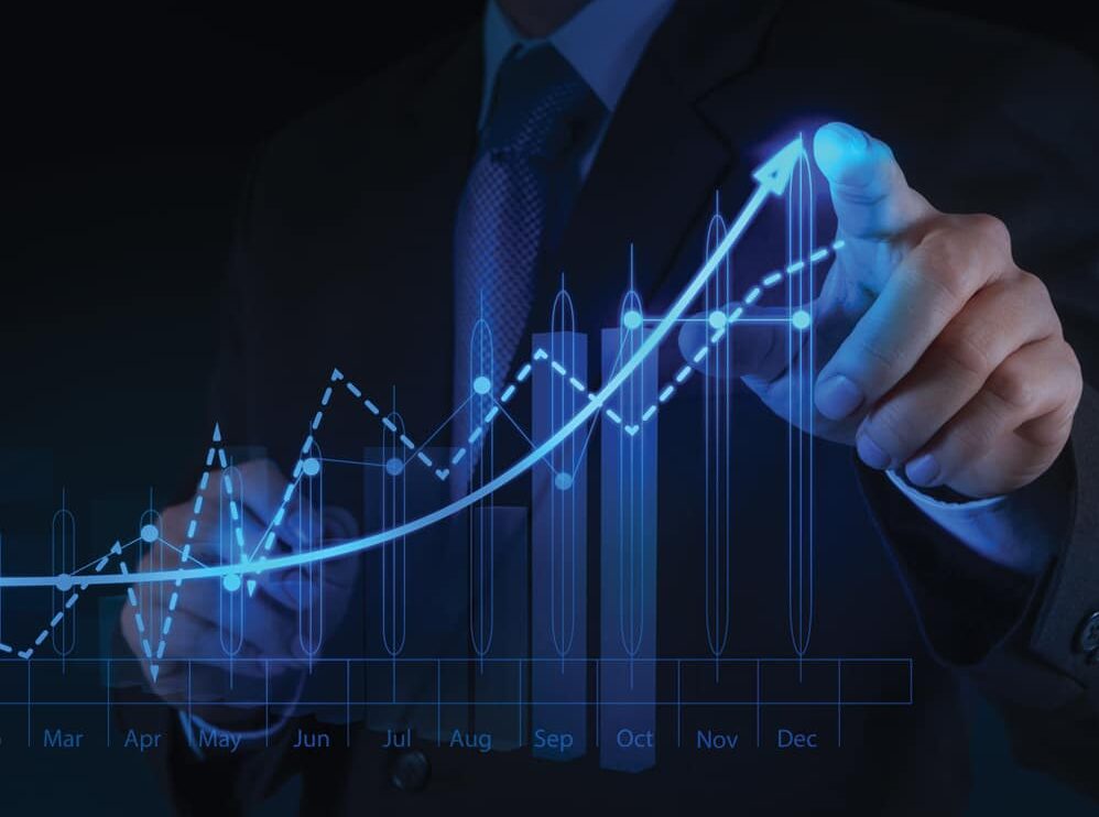 Image of a man pointing a finger highlighted making a graph