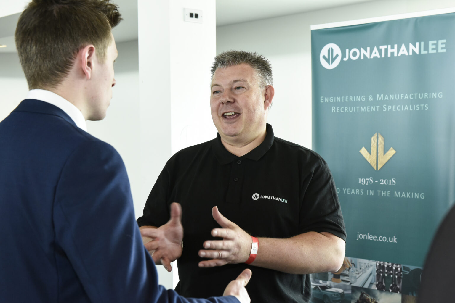 Jonathan Lee Recruitment consultant talking to client