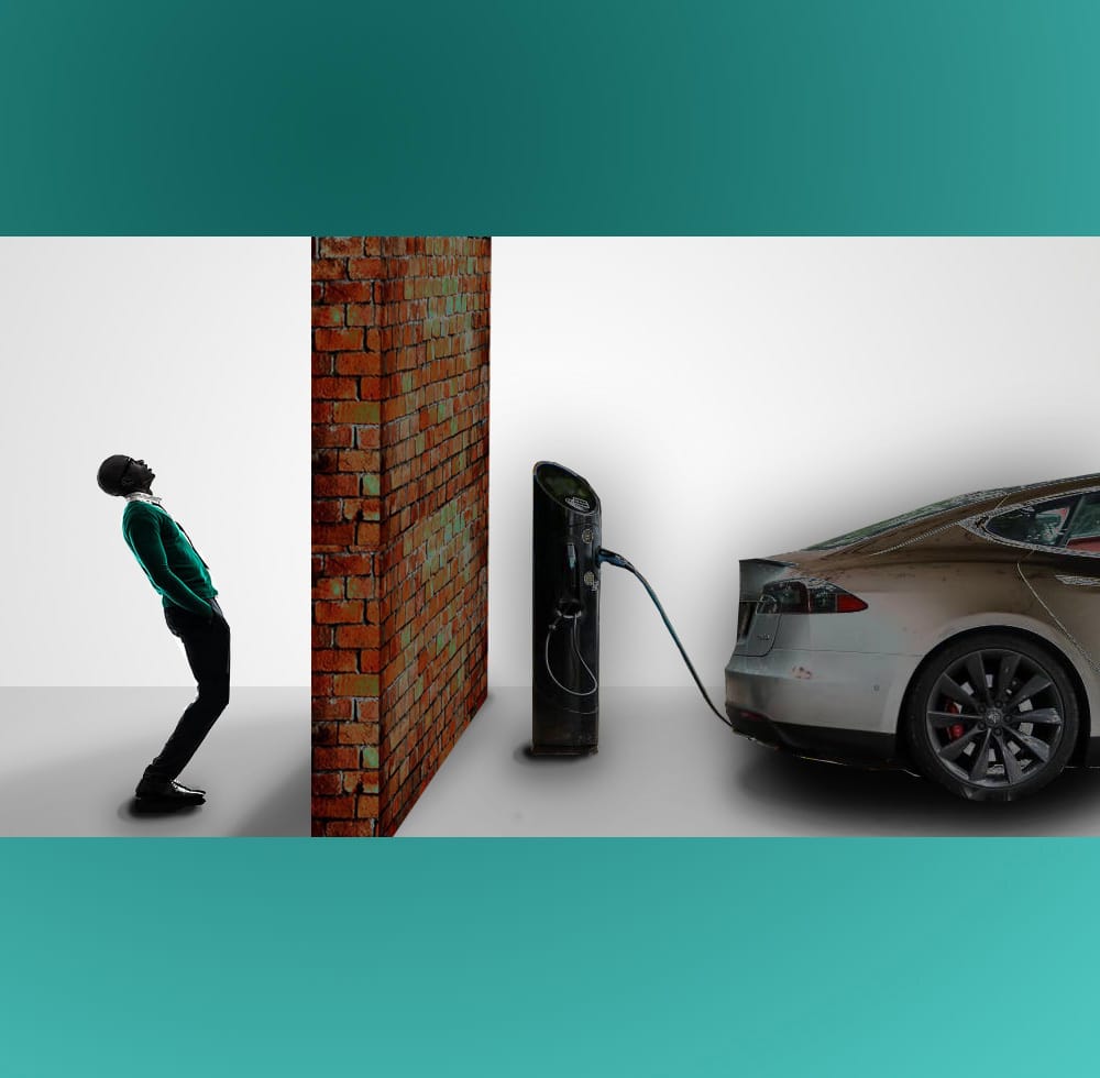 Car being charged by a brick wall