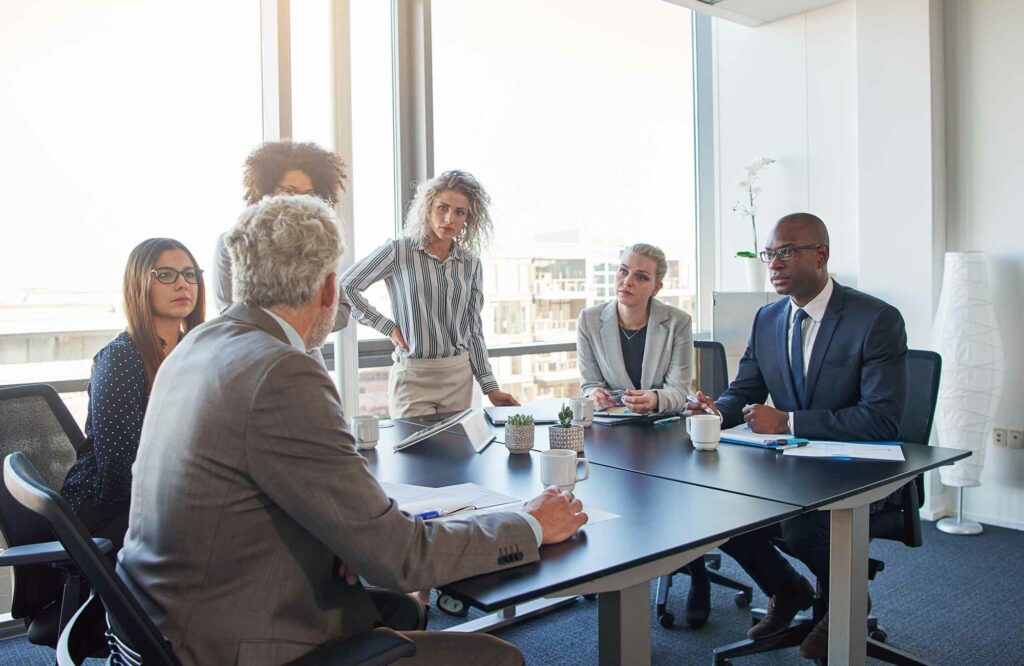 Diverse employees having a meeting