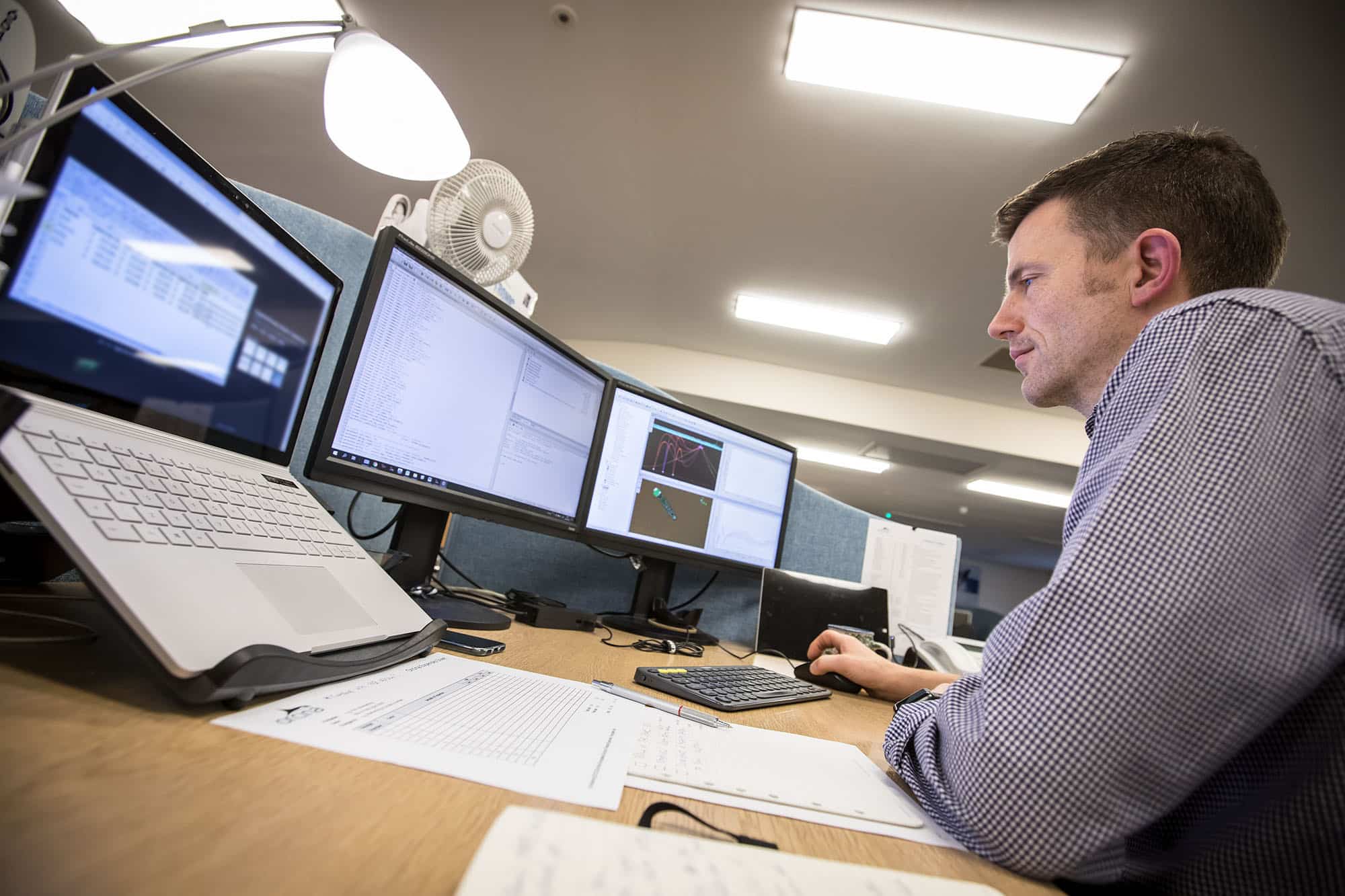 Orcina employee looking at screen