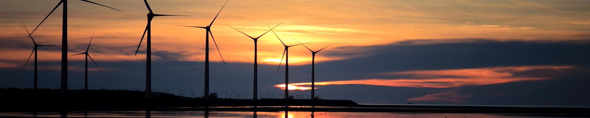 wind turbines at sunset