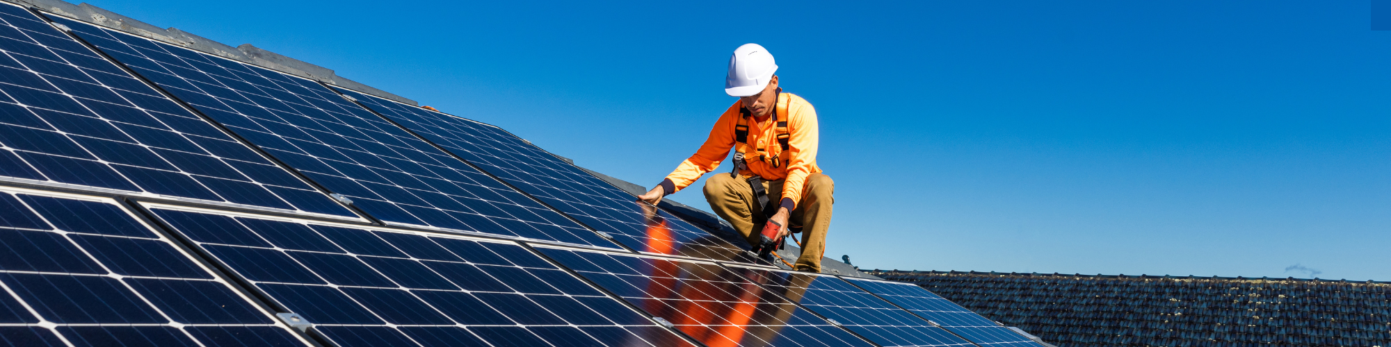 Engineers at work on solar PV installation