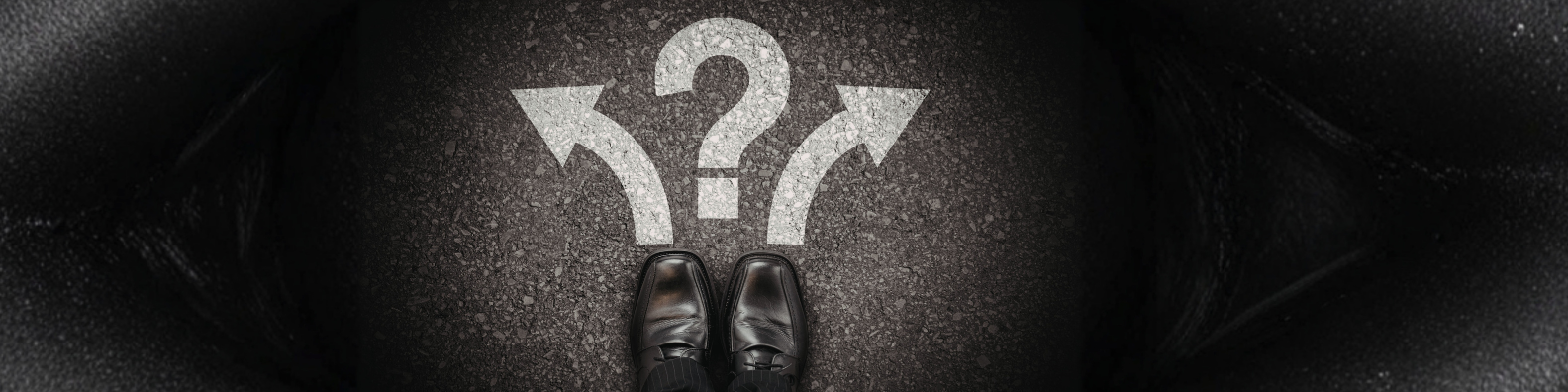 Person standing at a crossroads